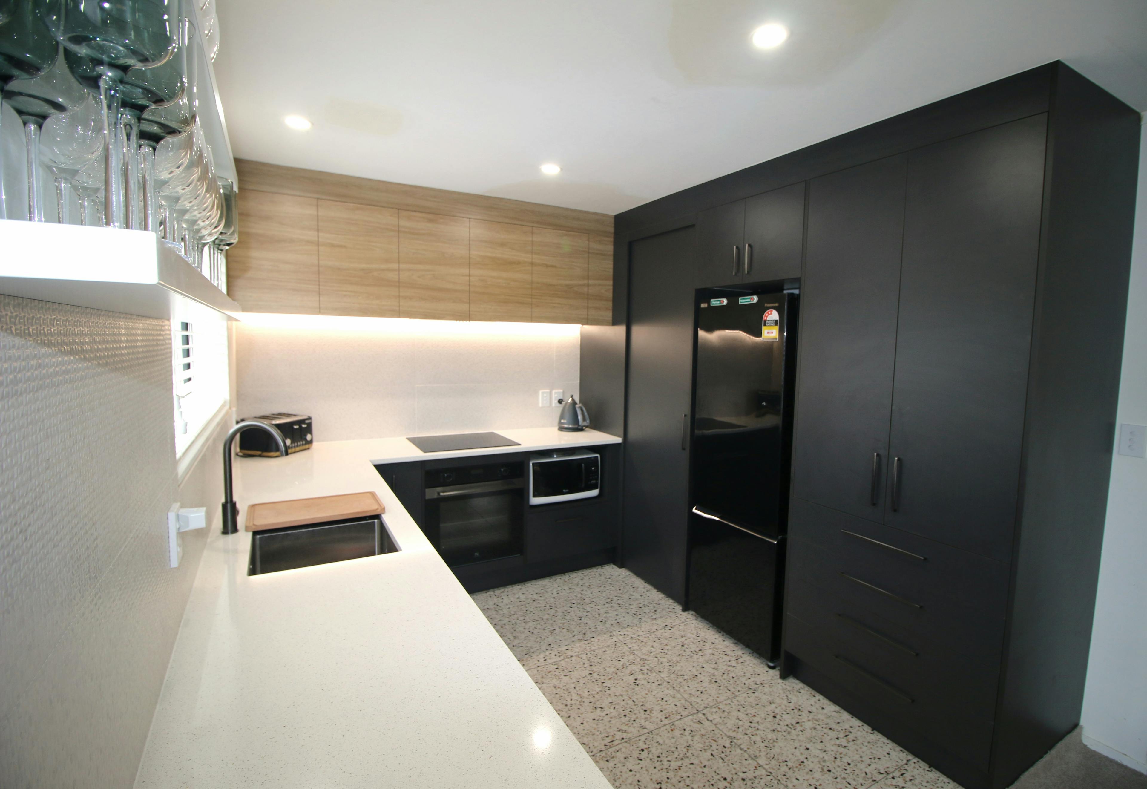 A background picture a kitchen designed and installed by The Kitchen Zone